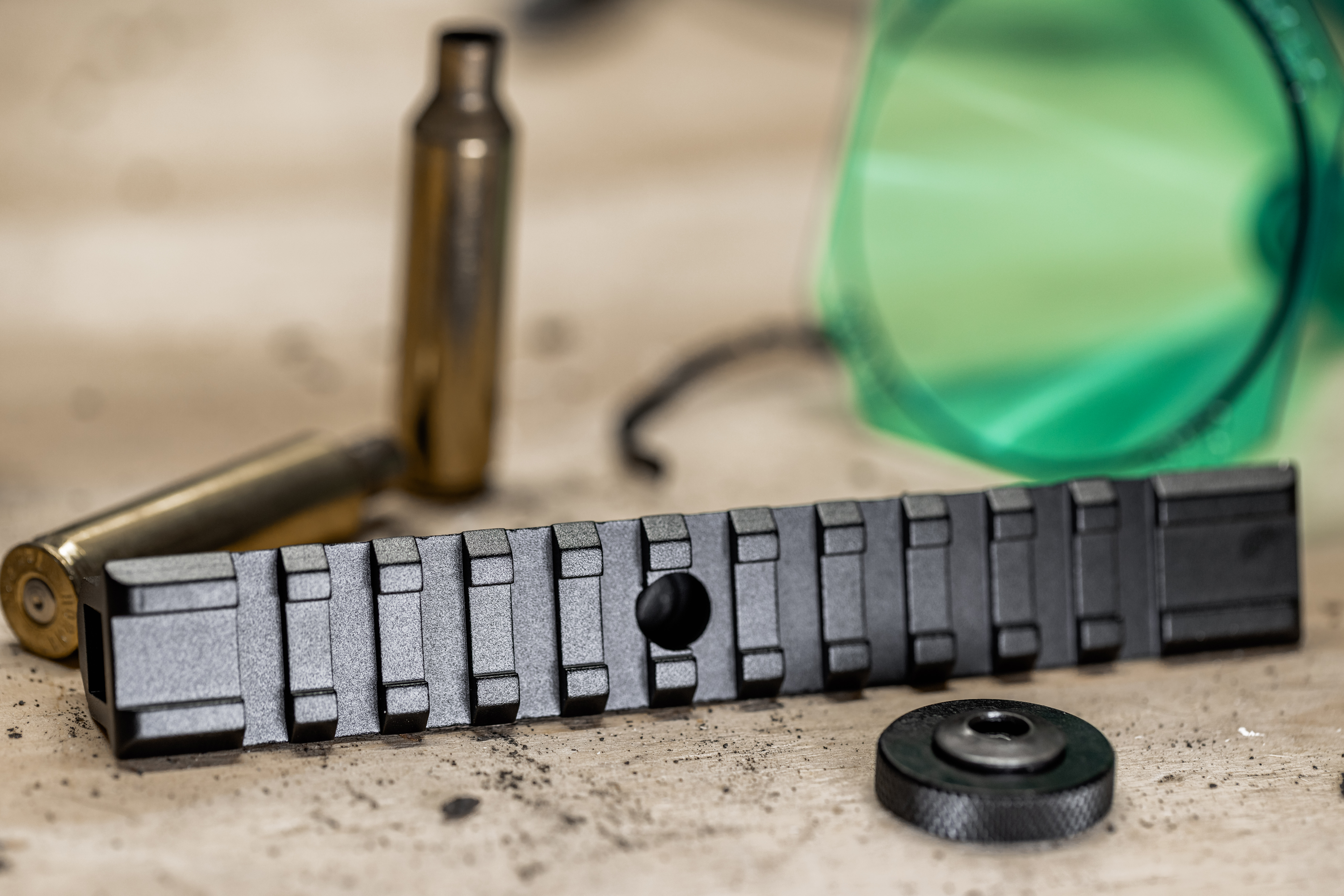 Close up of scope base mounted on rifle receiver