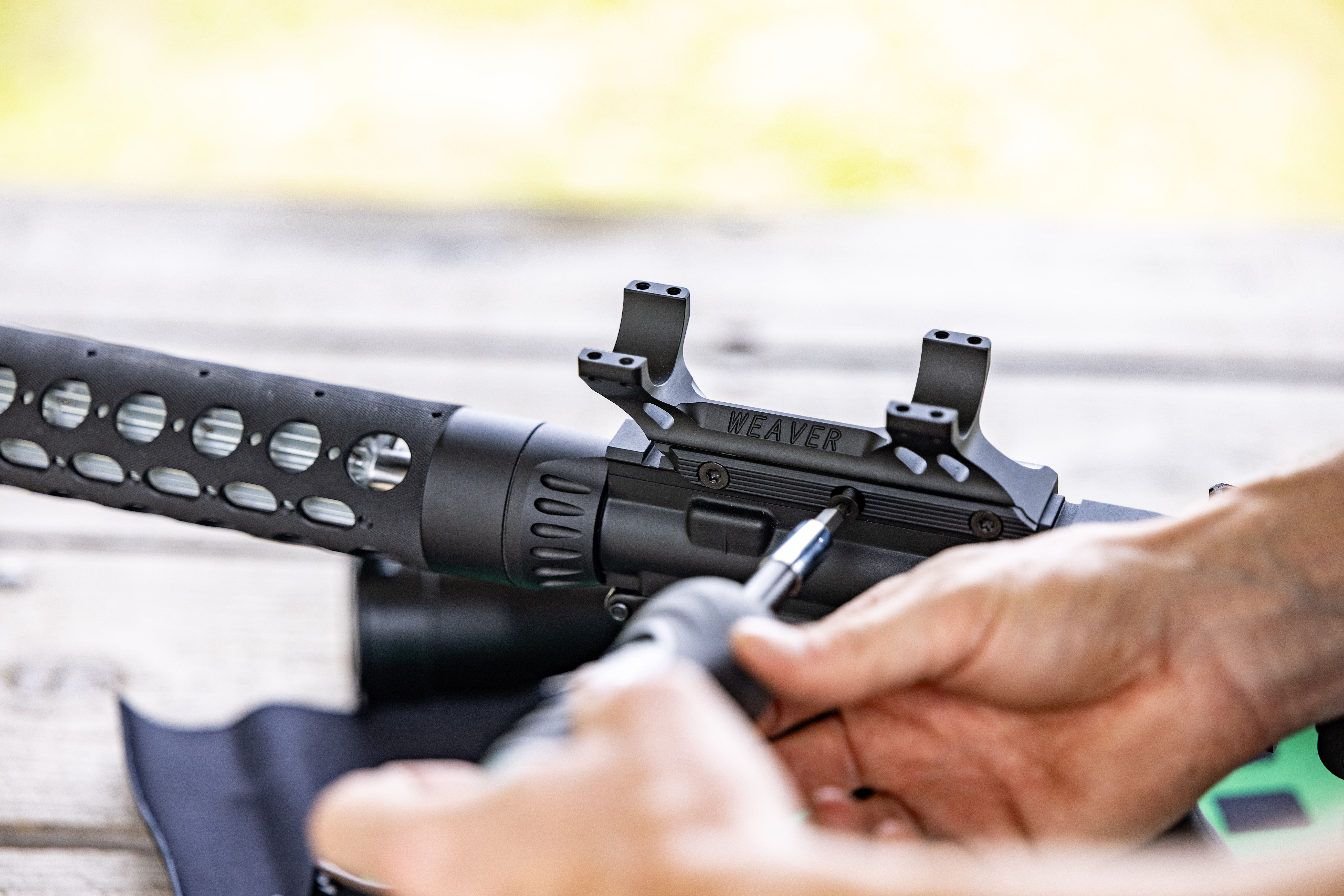 A rifle fitted with a Weaver scope mount